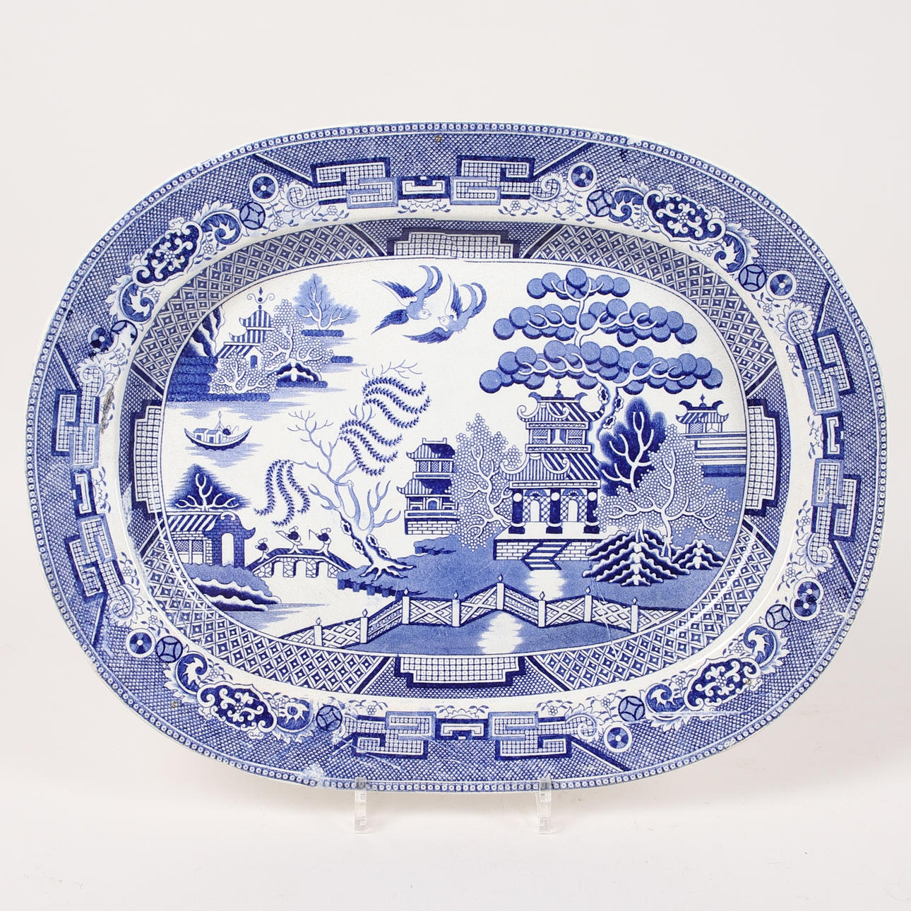 A flintware 'Willow' frying pan, possibly England, 18th/20th century.