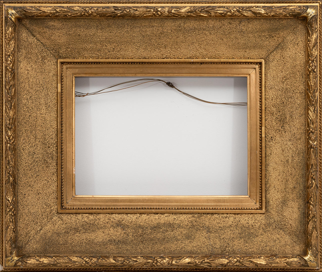 A gilded late 19th century picture frame.