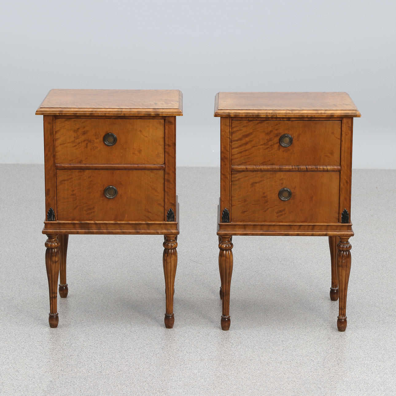 BEDSIDE TABLE, A COUPLE. Birch. 20th century. Neoclassicism.