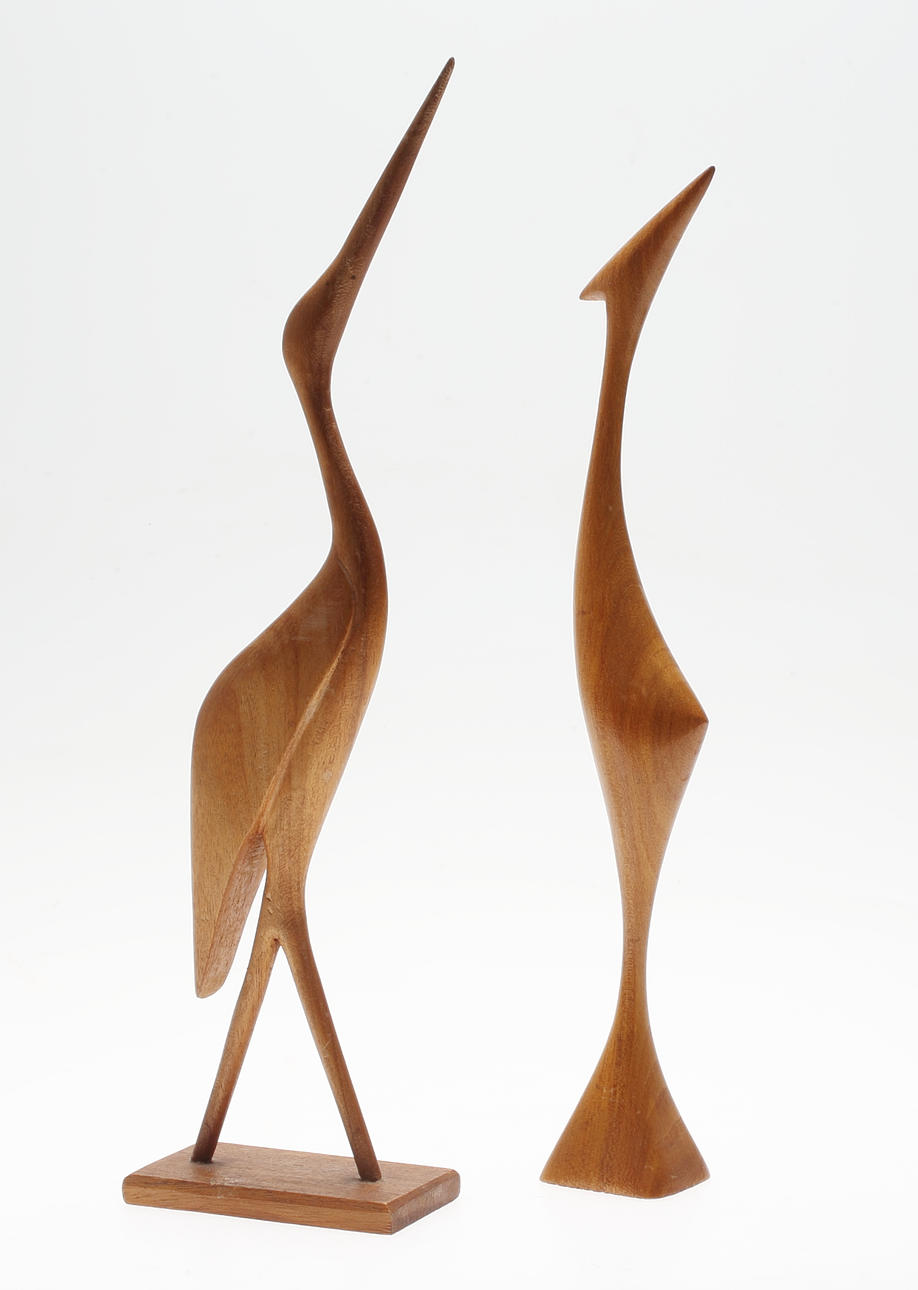 SCULPTURES, waders, teak, mid 20th century.