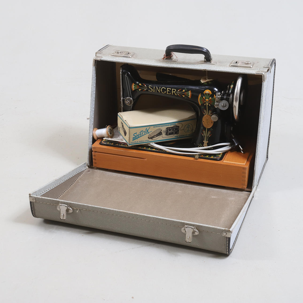 Singer Manufacturing Co., electric sewing machine, 20th century.