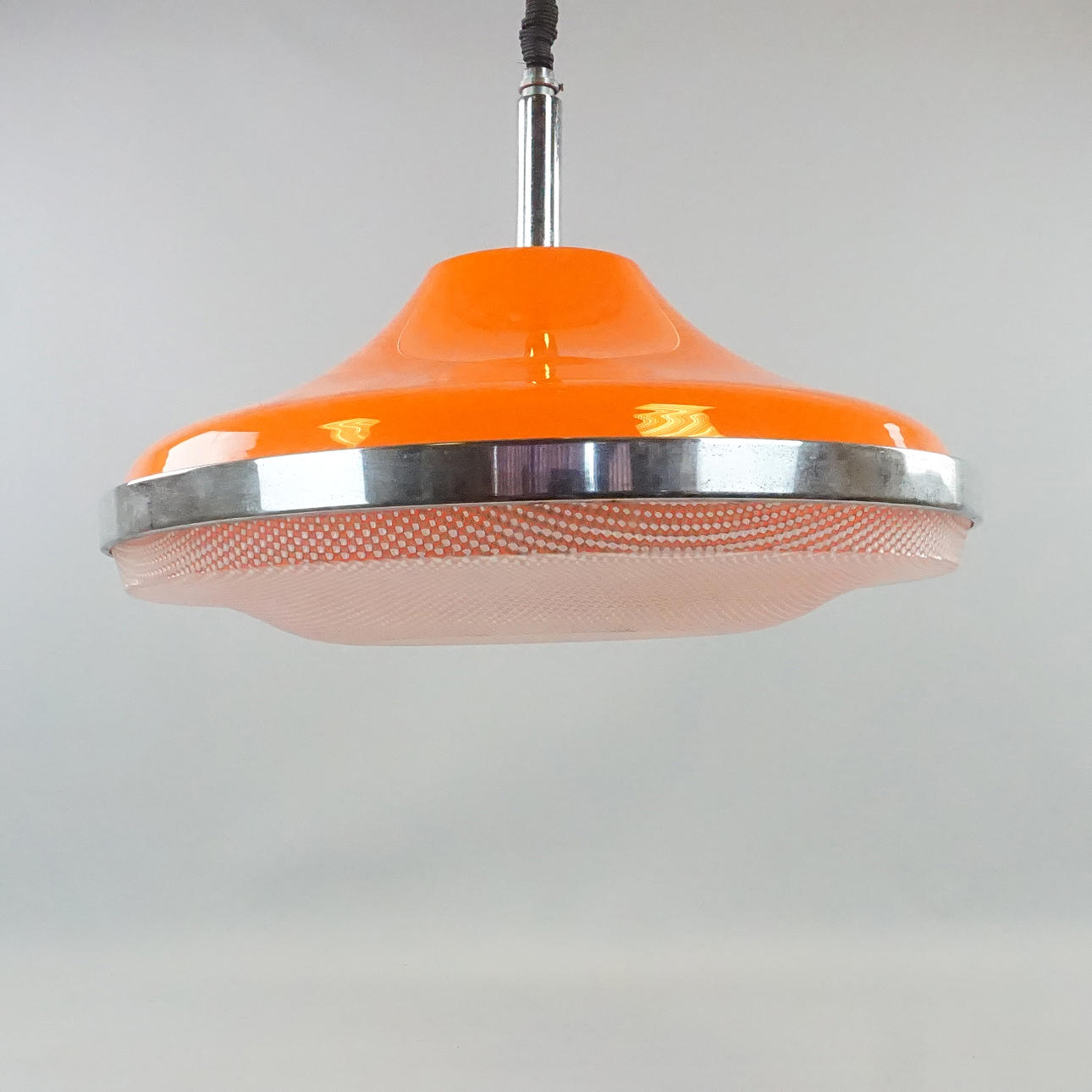 A 1970s plastic/metal ceiling lamp.