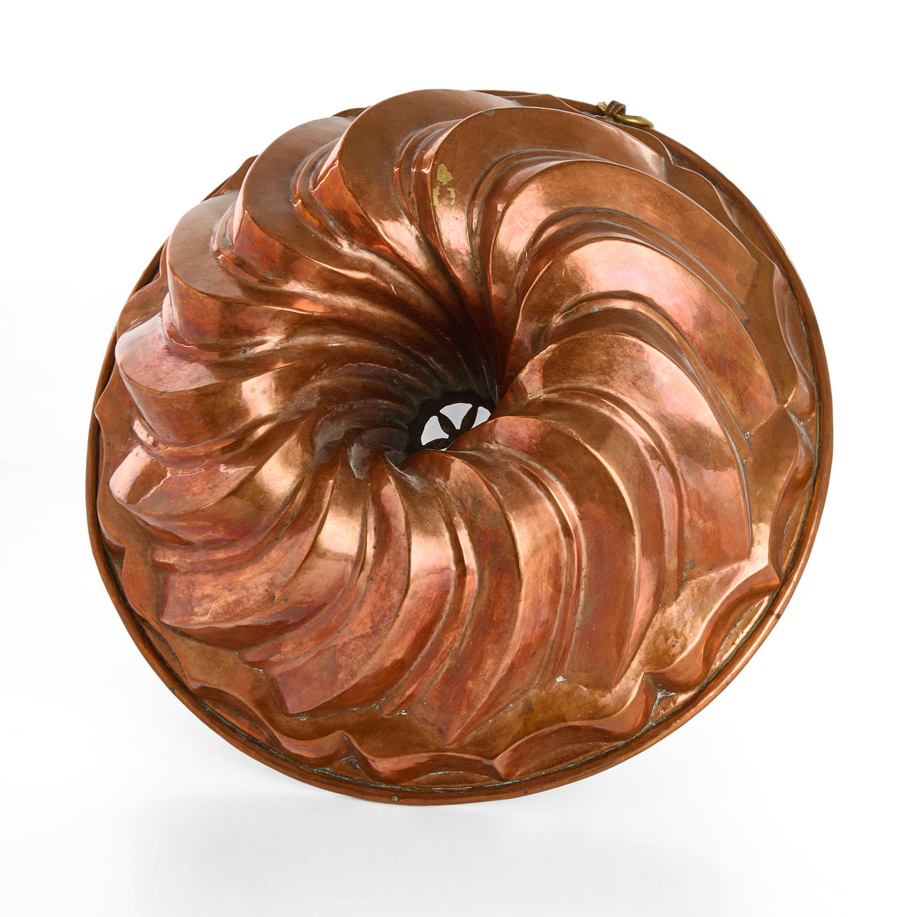 A 19th century copper ALADOBE FORM.