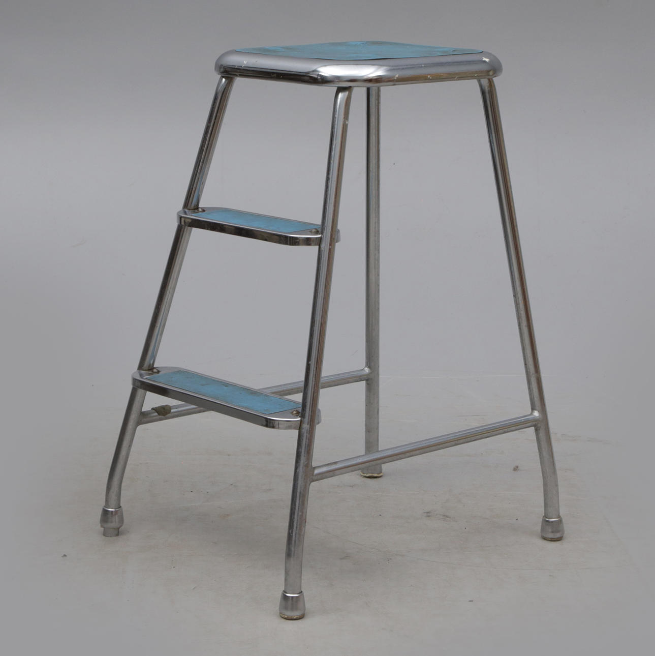 A metal stepladder, Awab.