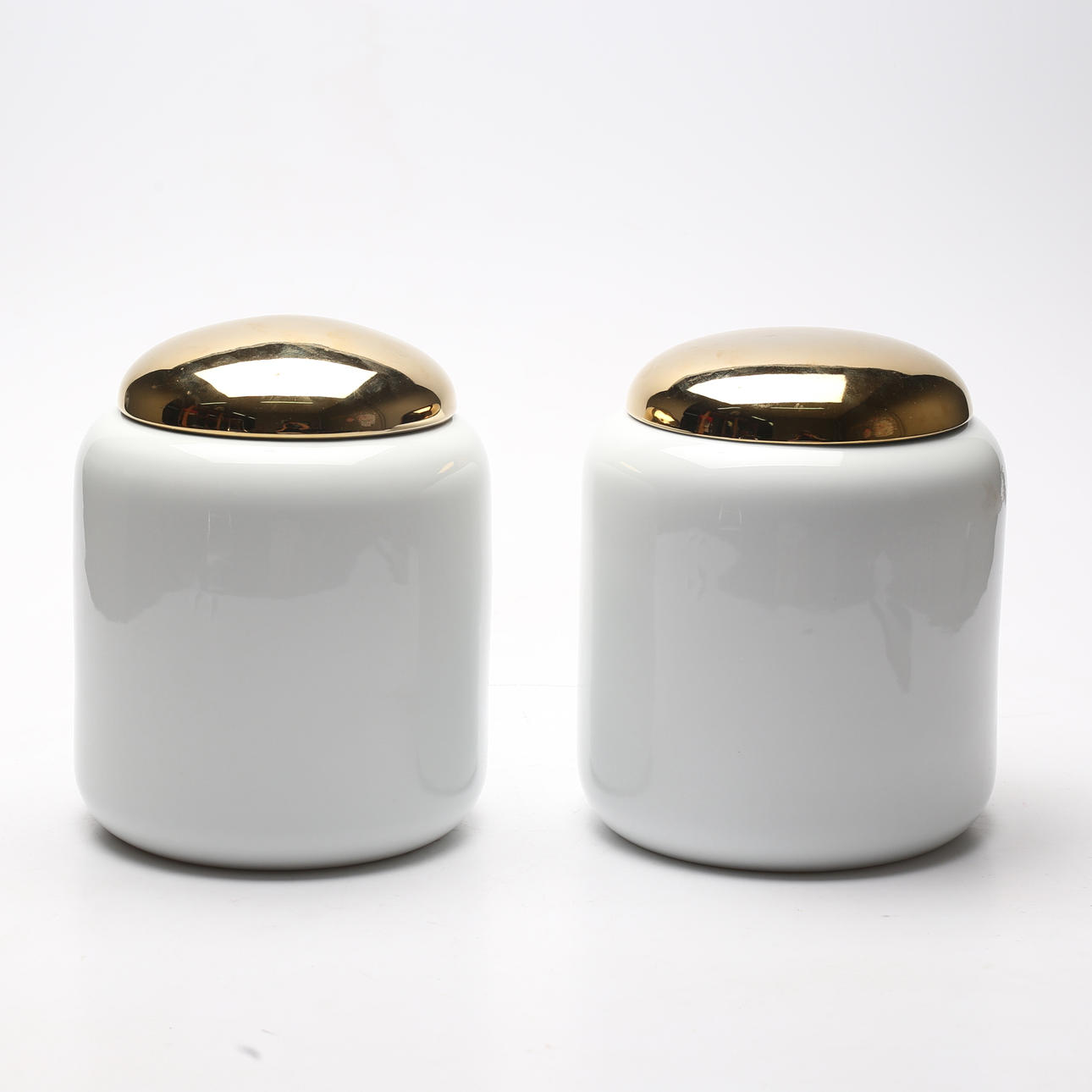 A pair of ceramic lockurns.