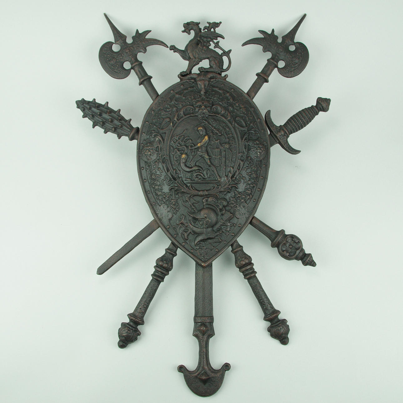 VAPENSKÖLD, gjutjärn, samtida.