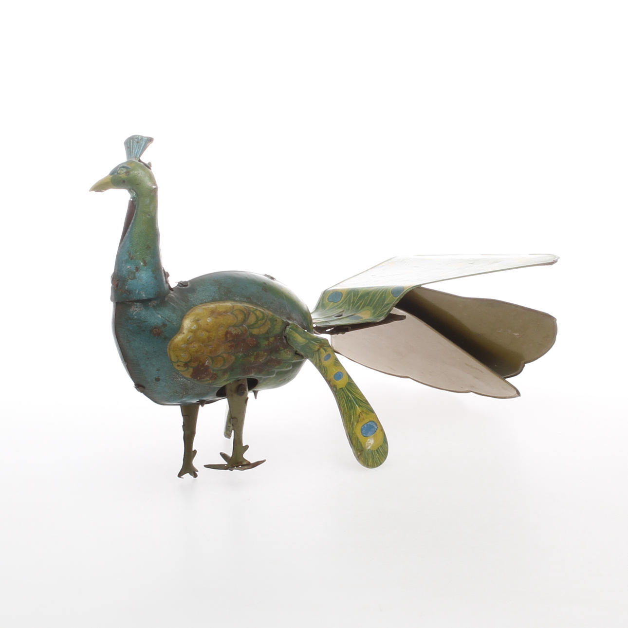 PLÅTLEKSAK, Påfågel, Blomer & Schüler, Tyskland 1920-tal. Urverk.