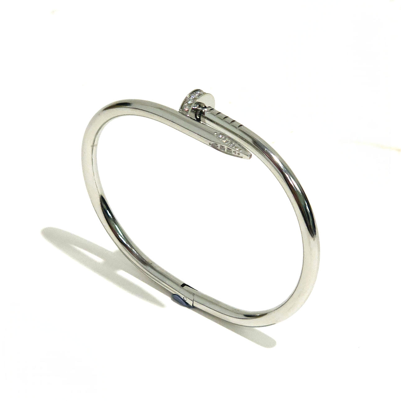 PULSERA "CLAVO" EN ACERO CON CIRCONITAS.