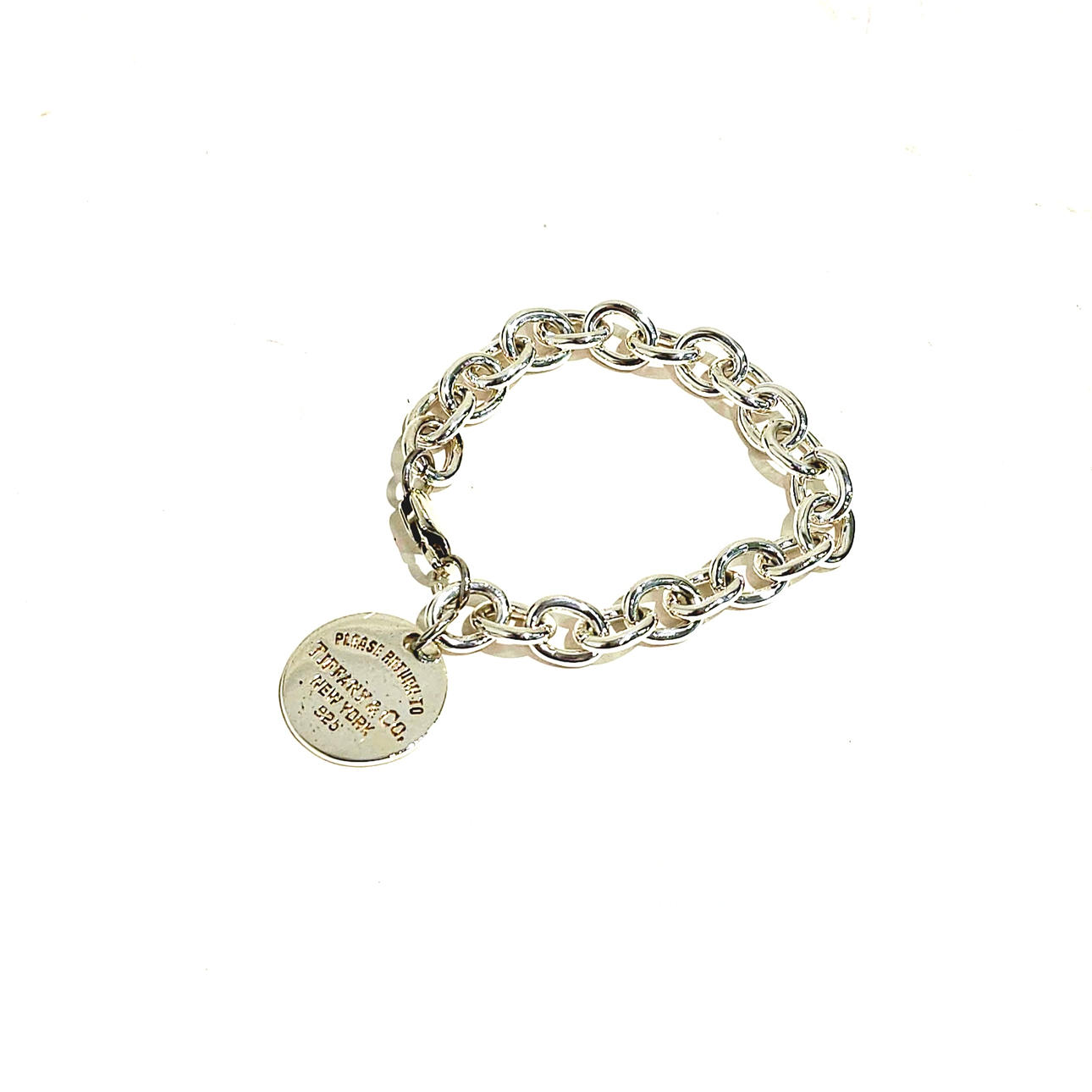 PULSERA TIFFANYS EN PLATA CON MEDALLÓN.