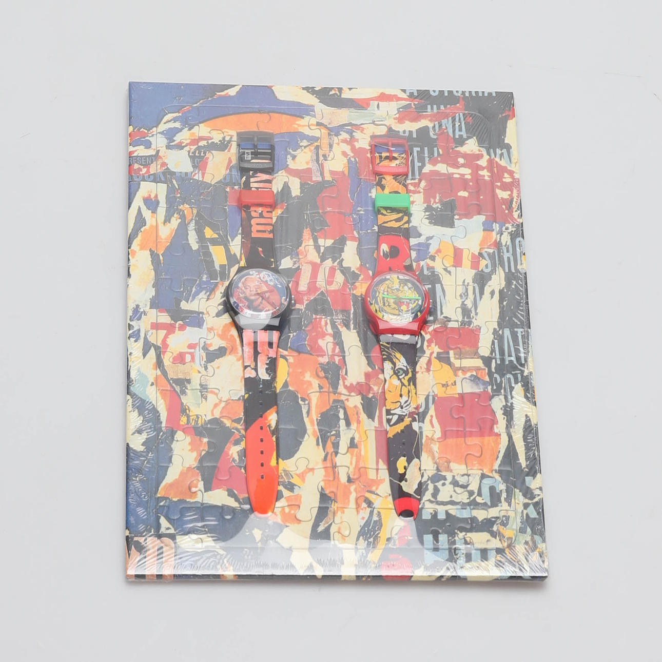SWATCH, a two-piece “Mimmo Rotella” wristwatch, 1994. Clocks 
