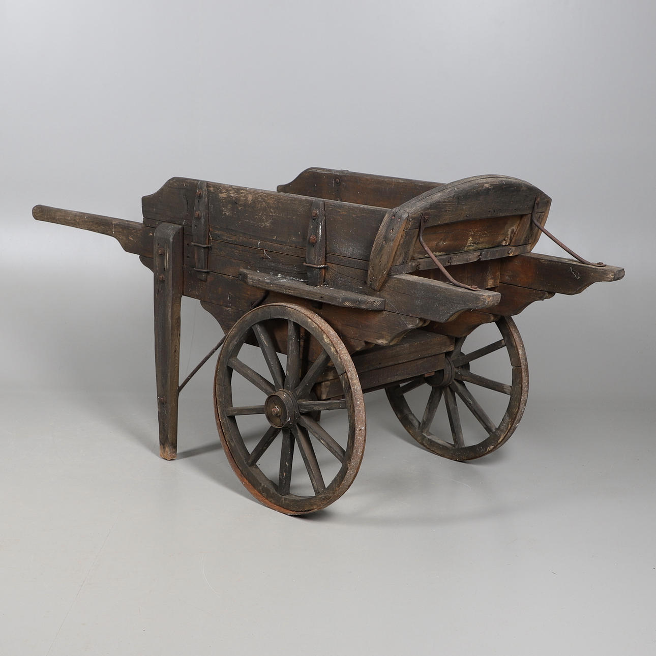 A VINTAGE HAND CART.