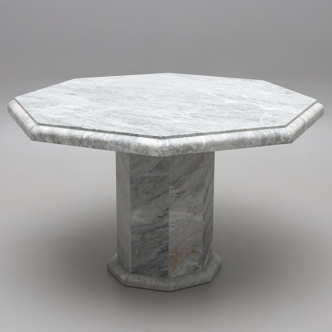 A two-piece marble dining table, octagon shaped, 1980s.