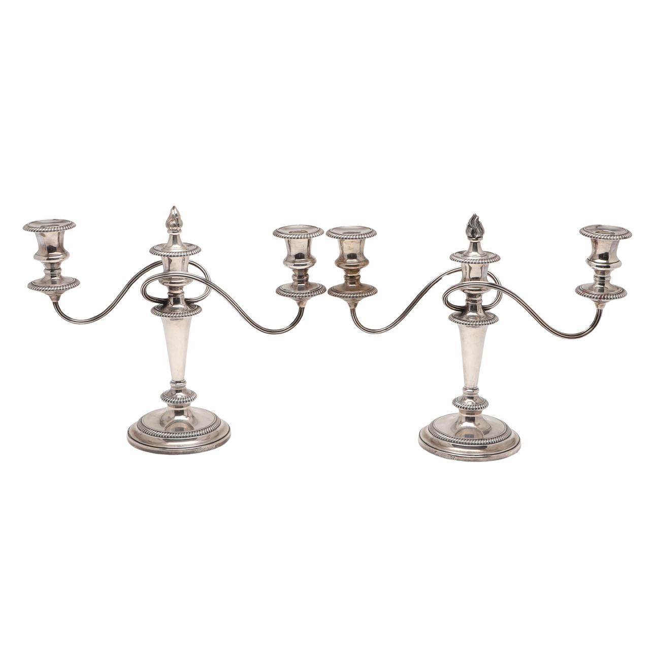 A PAIR OF SILVER PLATED CANDELABRA.