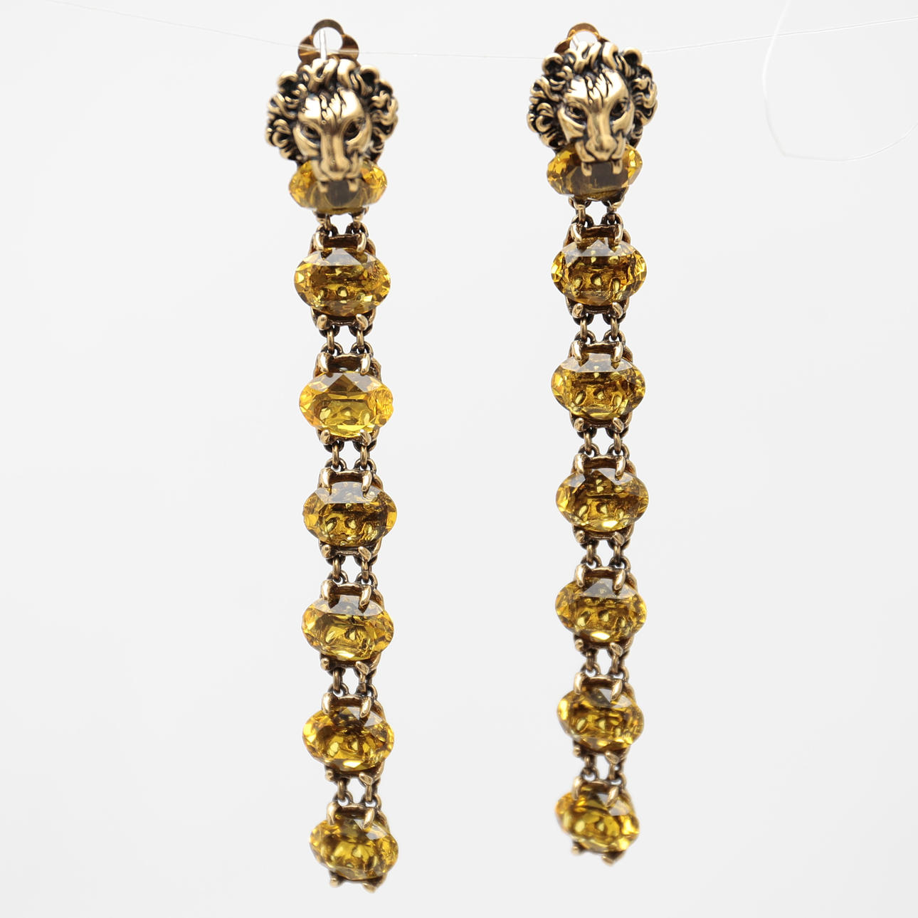 GUCCI. Lange Ohrringe mit Löwenkopf.