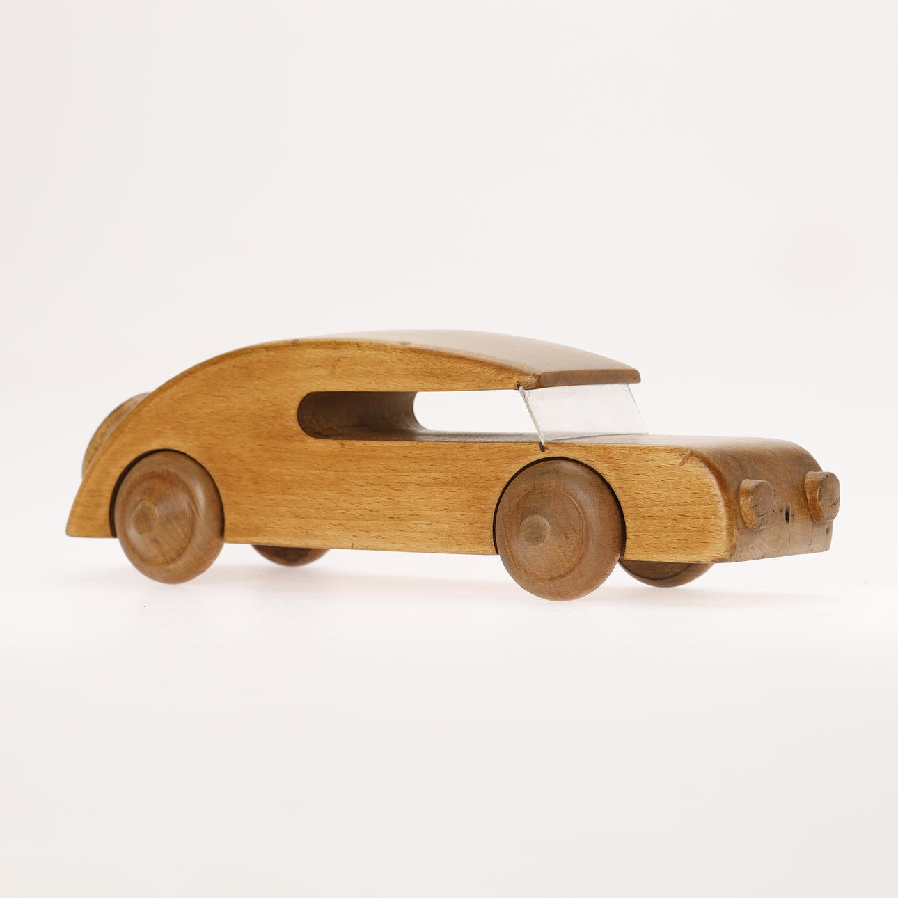 KAY BOJESEN. “Automobil Sedan” toy car, solid carved beech
