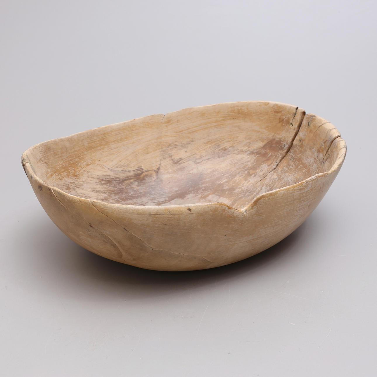 A bowl, almoge, wood, dated -1732.