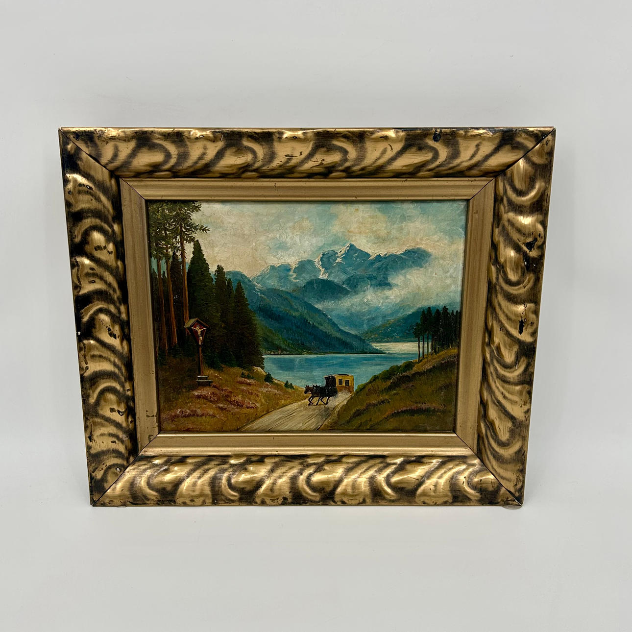 STAGECOACH RIDE THROUGH LANDSCAPE WITH MOUNTAIN LAKE - UNSIGNED.