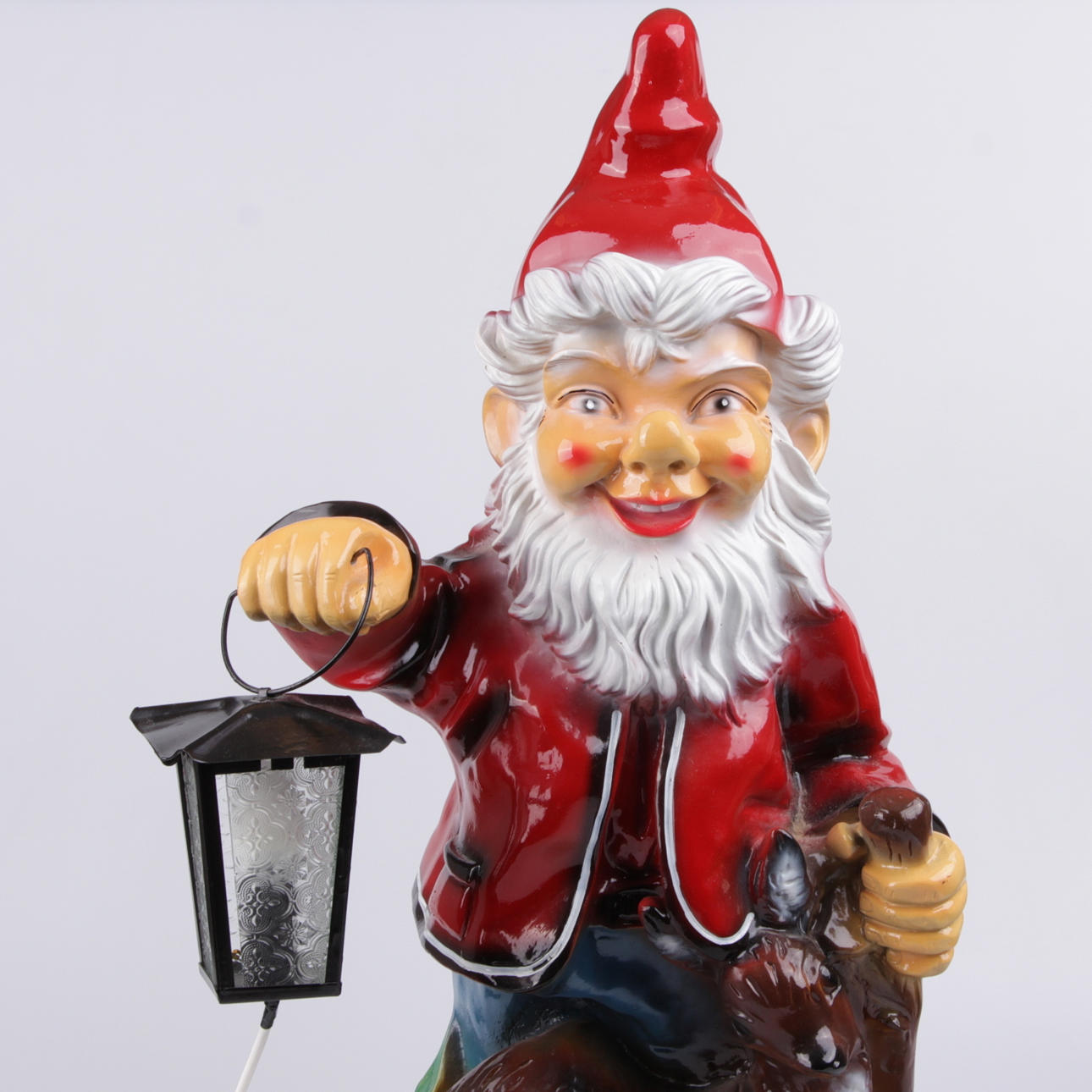 TRÄDGÅRDSTOMTE, med belysning, kompositmaterial, 1900-tal, höjd 75 cm.