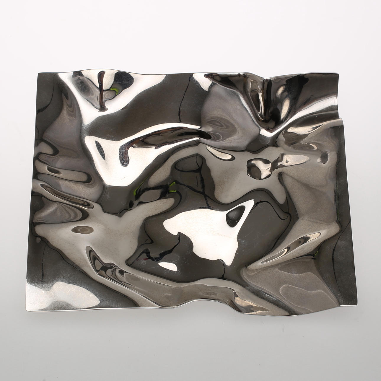 FAT, "Crash", Verner Panton, för Georg Jensen, blankpolerad metall.