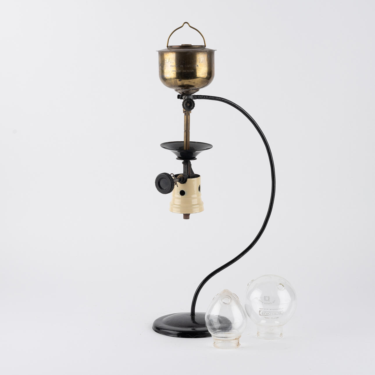 A 20th century Radius no 107 table lamp for spirits.