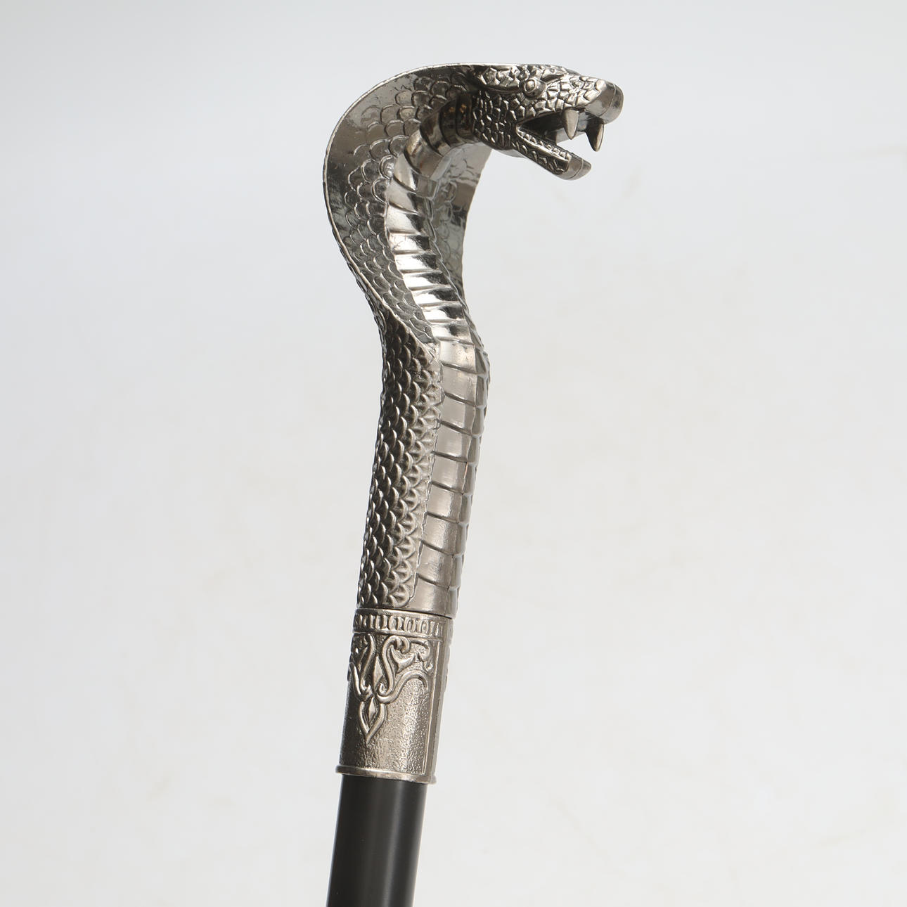 SWORDSTICK, cobra head.