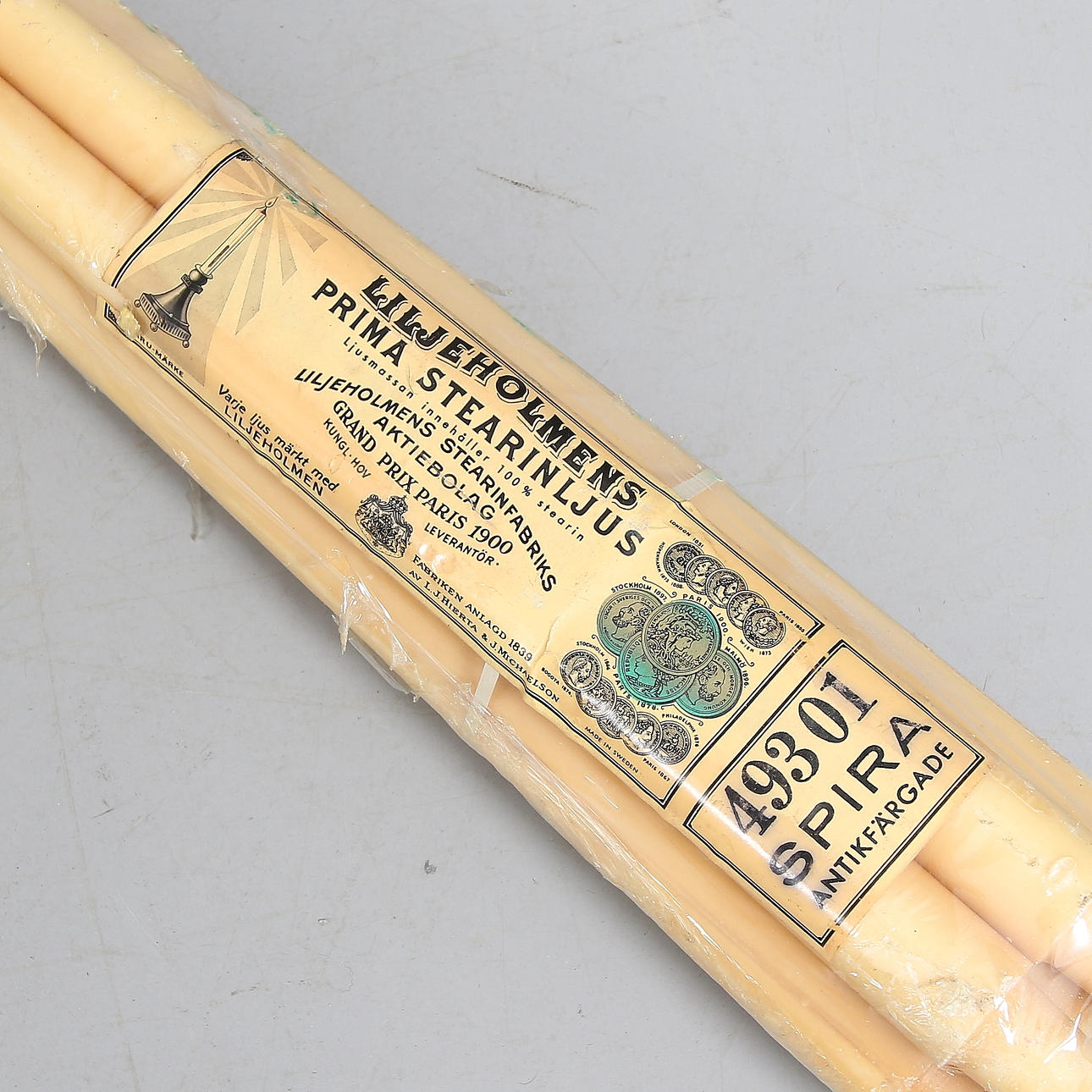 STEARINLJUS, 7 st. "Spira 49301" Liljeholmens Prima Stearinljus, antikfärgade. 1900-talets andra hälft.