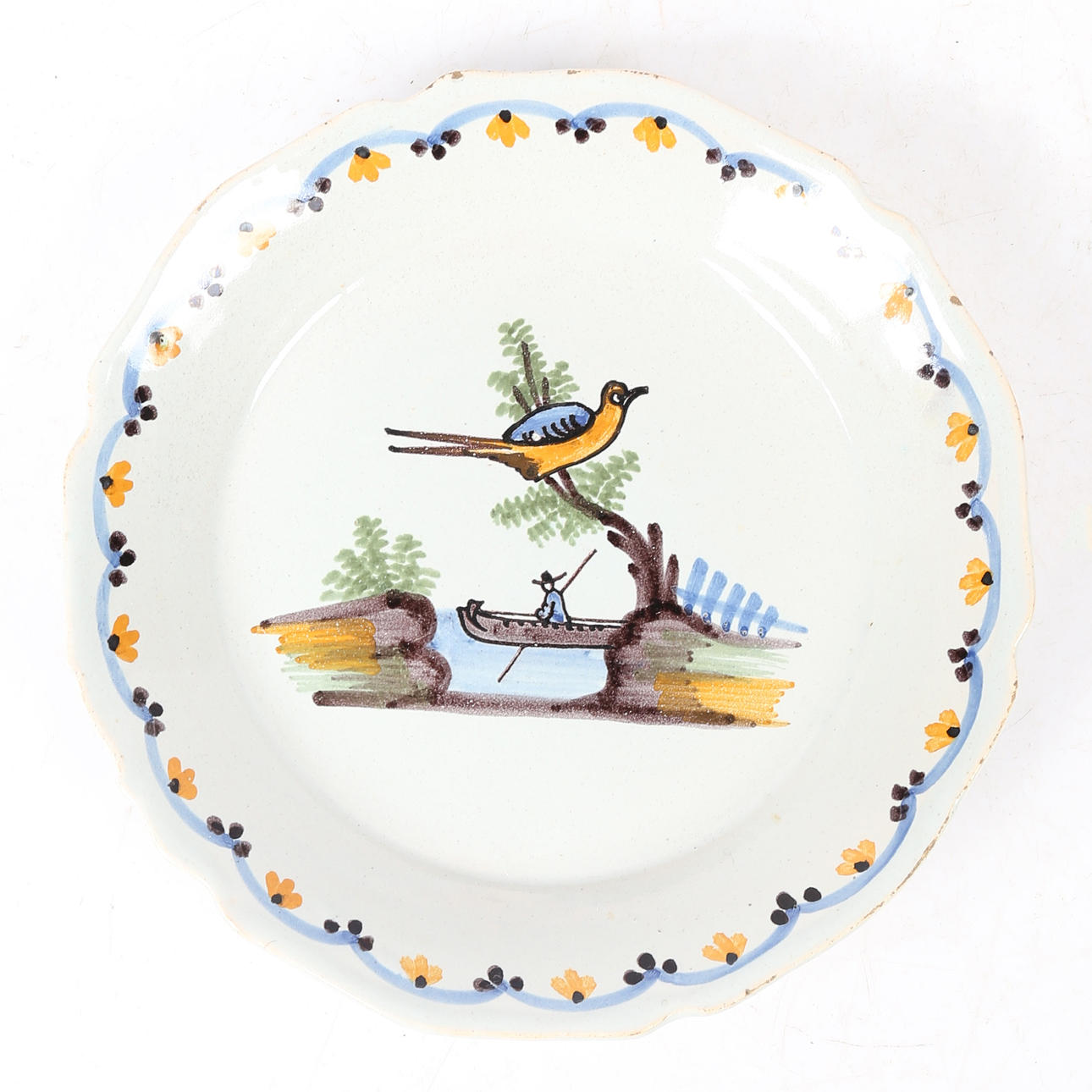 A 19TH CENTURY FAIENCE BOWL.