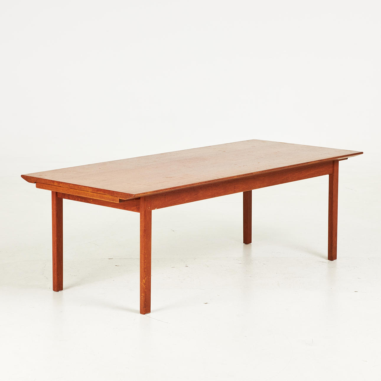 COFFEE TABLE. 1960s, teak, with extendable discs.