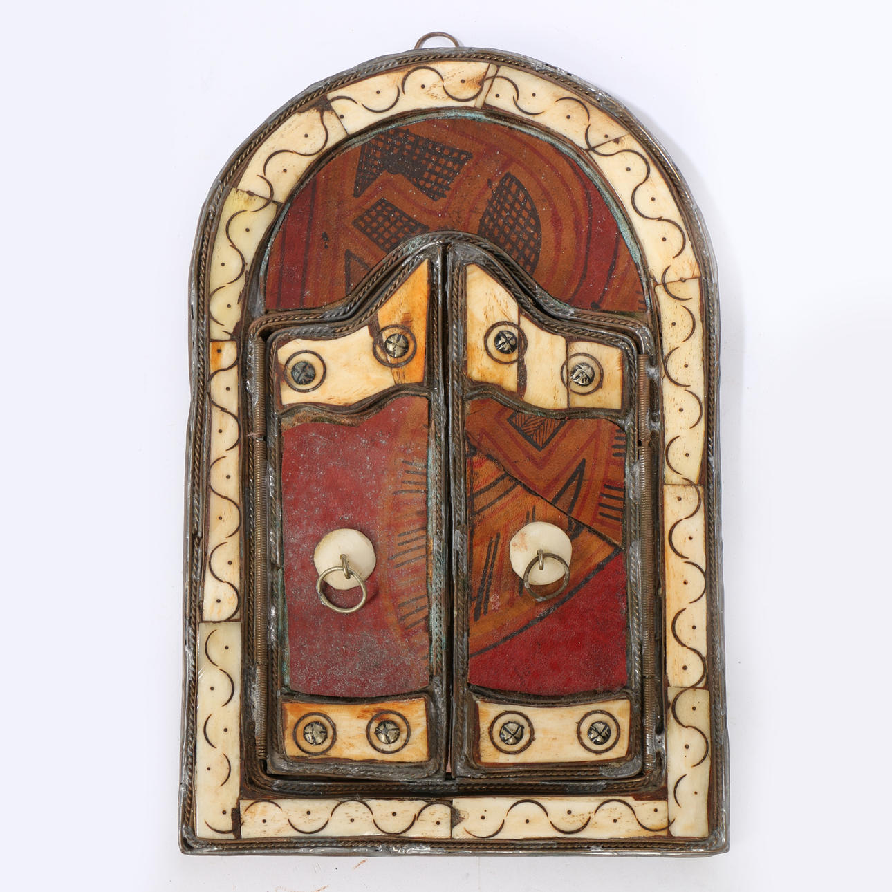 ET LILLE MAROKKANSK KNOGLETRIPTYKSPEJL.