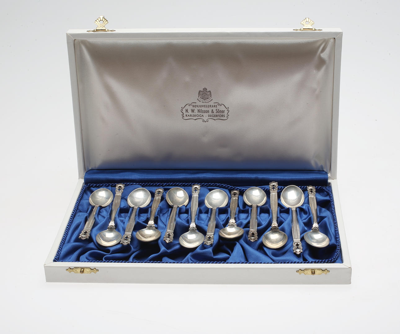 KAFFESKEDAR, 12 st, "Konge Acorn", Johan Rohde för Georg Jensen, 1900-tal.