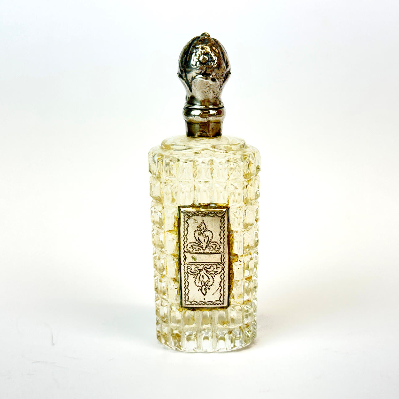 ANTIQUE FRENCH SILVER MOUNTED PERFUME BOTTLE.