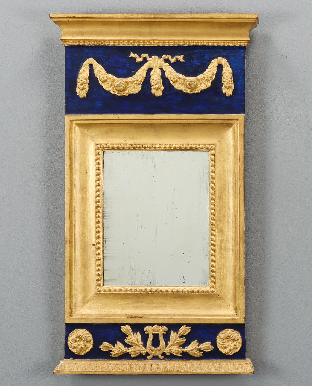 A mid 19th century empire mirror.