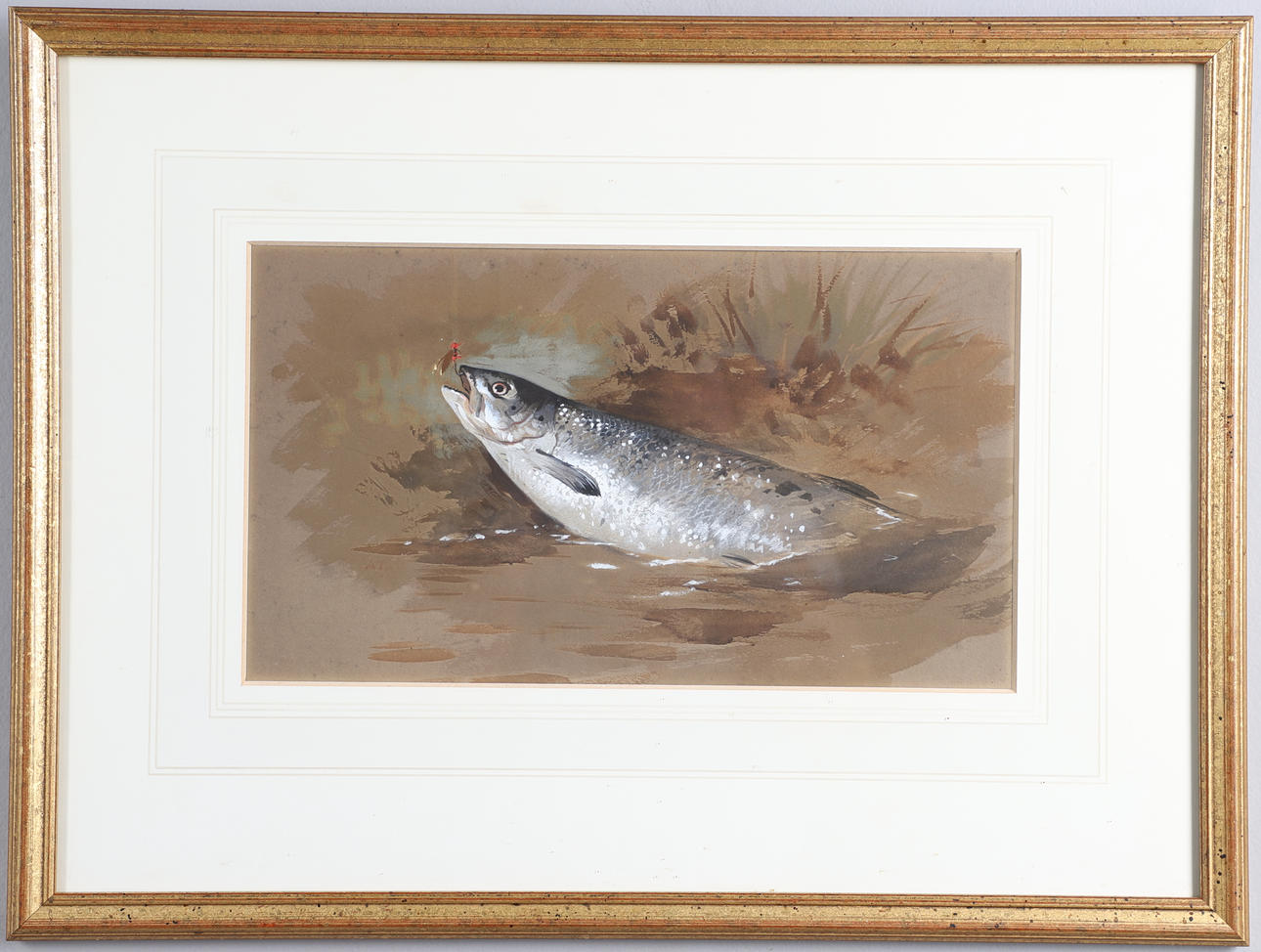 ARCHIBALD THORBURN (1860-1935). SEA TROUT BY A GRASSY BANK.