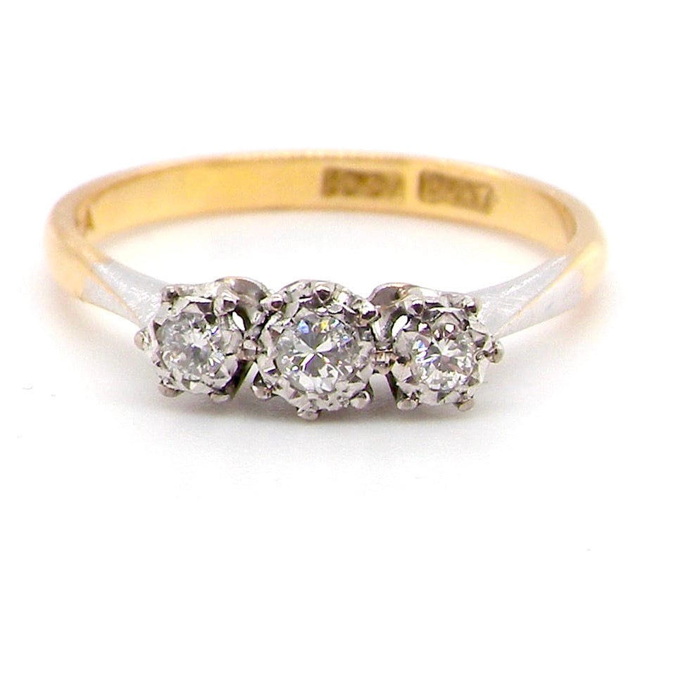 18CT, PLATINUM & DIAMOND THREE STONE RING.