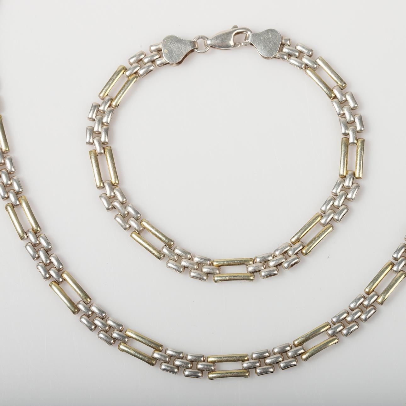 COLLAR Y PULSERA DE PLATA ESTERLINA.