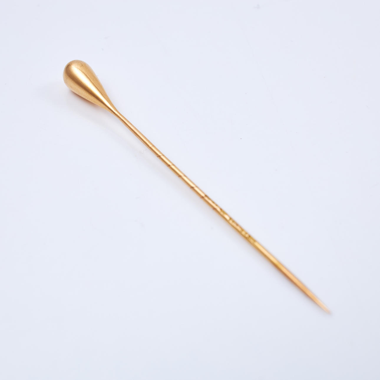 A TIE PIN, 18k gold, drop-shaped.