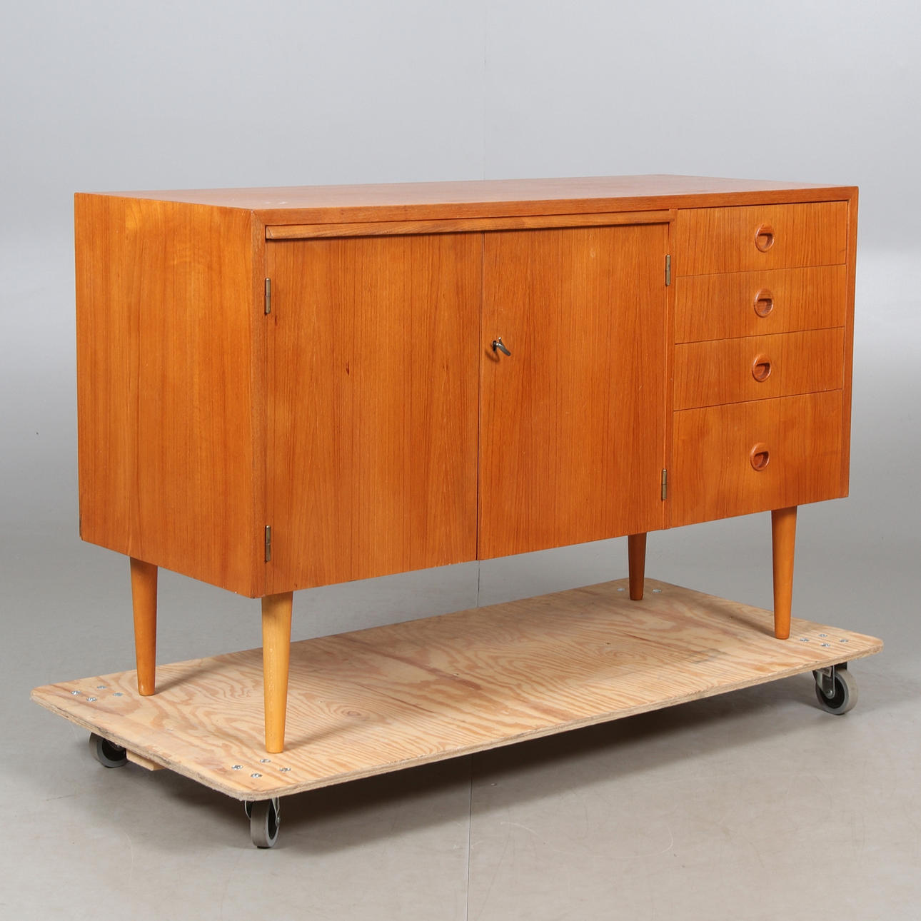 A 1960's teak sideboard.