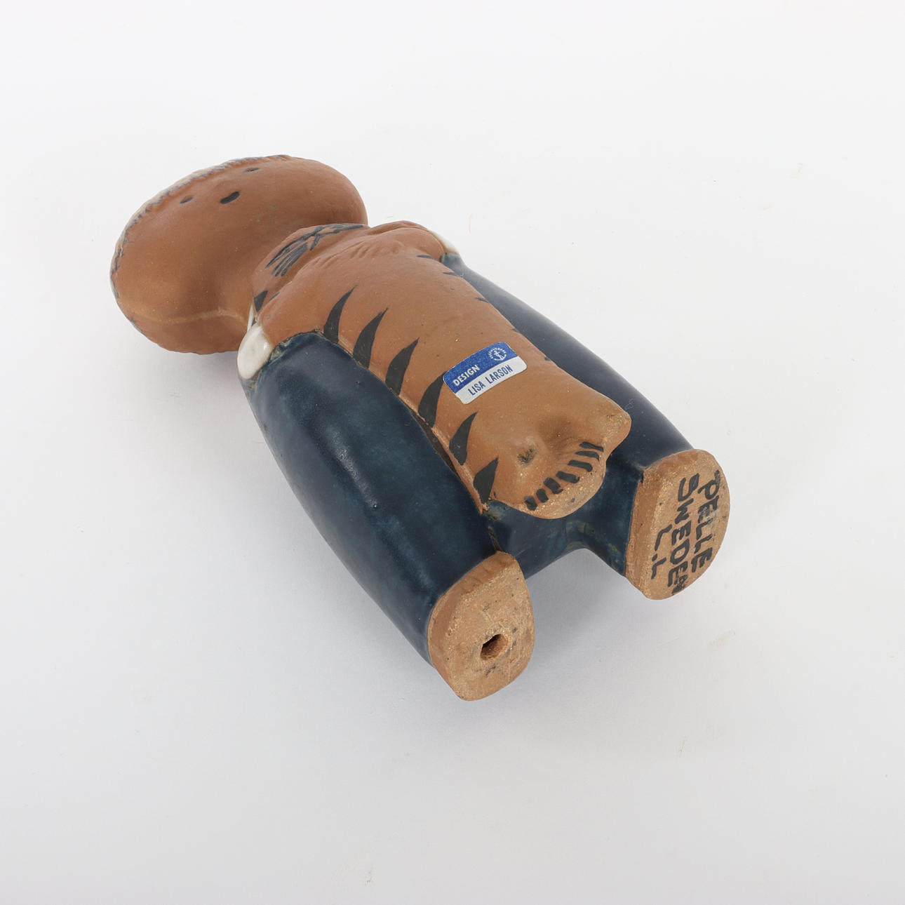 LISA LARSSON. 1931—2024. A stoneware figurine, “Pelle”, from the