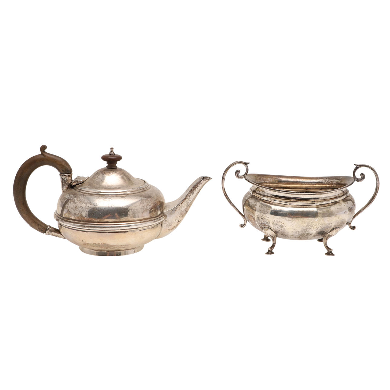 A SILVER TEA POT & A SILVER SUGAR BASIN.