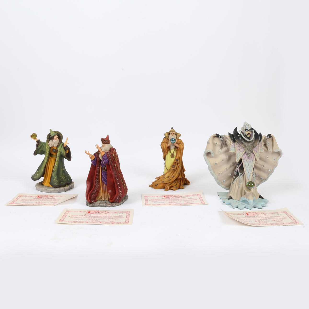 FOUR ENCHANTICA WIZARDS (4). Ceramics & Porcelain - European - Auctionet