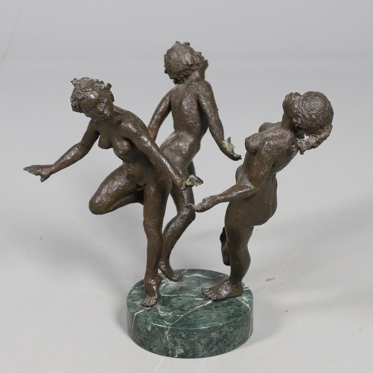 JOHN UHT (1924-2010) - BRONZE LIMITED EDITION GROUP OF DANCERS.