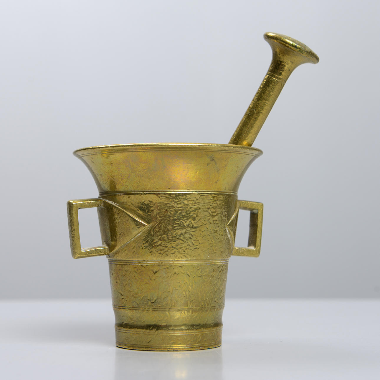 A brass mortar, 20th century.