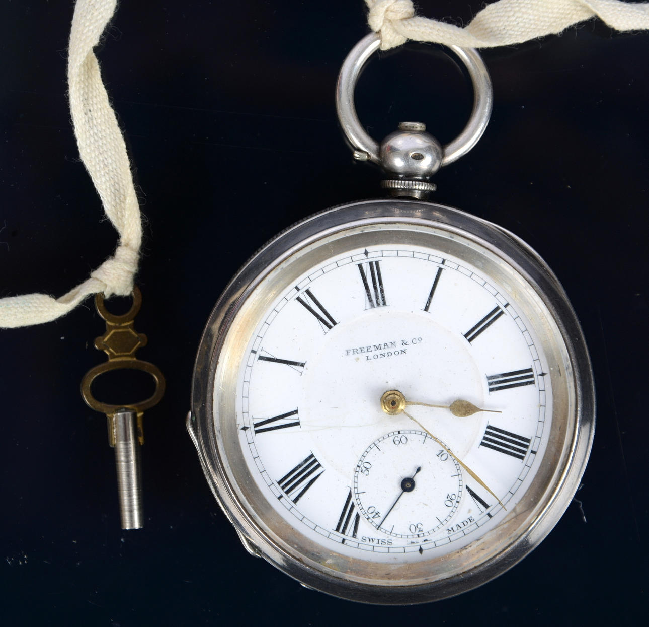 RELOJ DE BOLSILLO, plata de ley, Freeman co. Londres.