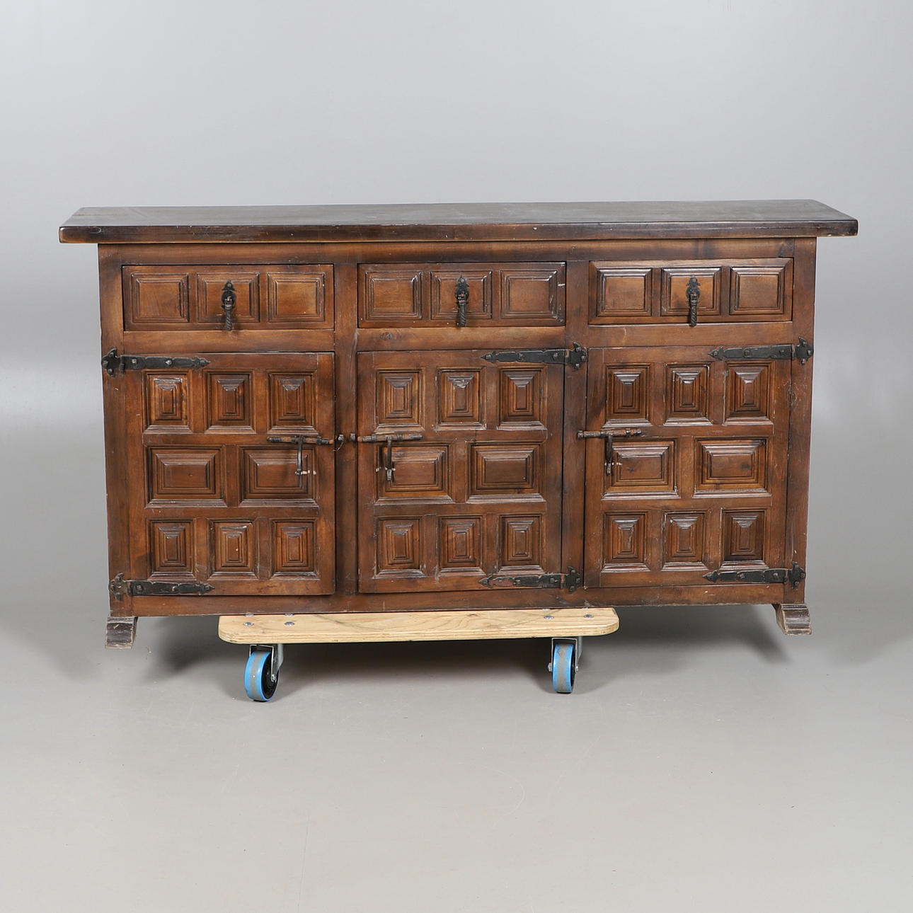 A HARDWOOD SIDEBOARD.