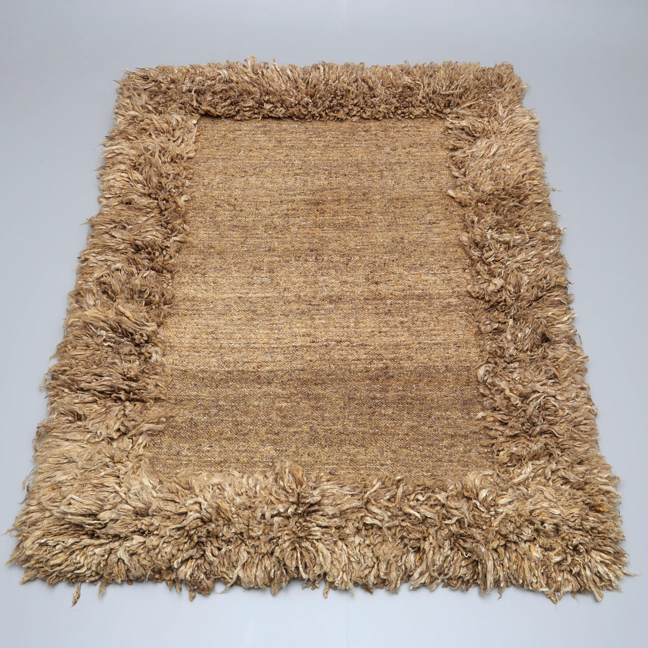 MARIE OLSSON NYLANDER. Ryamatta, ull, modell "Lollo", samtida.