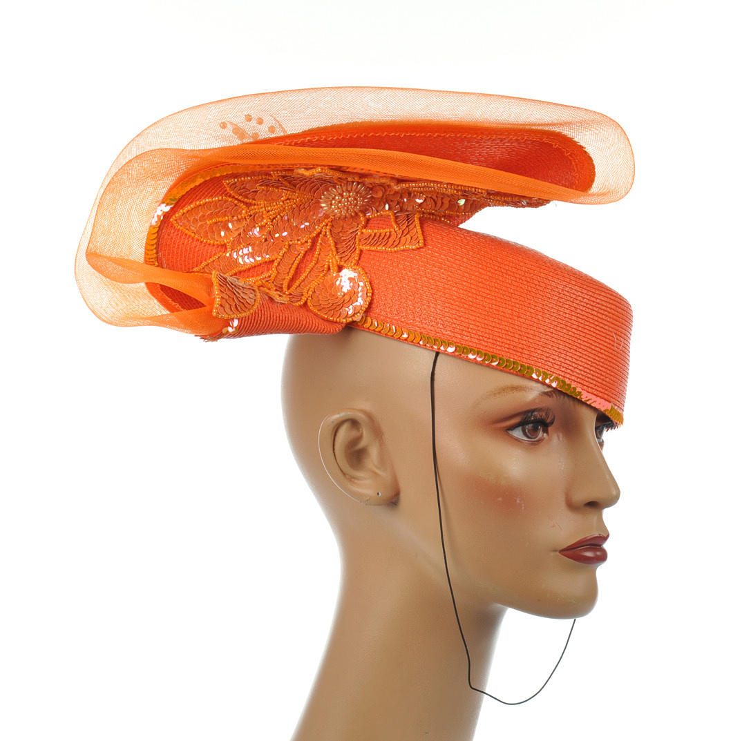 DAMENKAPPE MIT ZIERRAT. Stark orange hatt från 1970-talet.