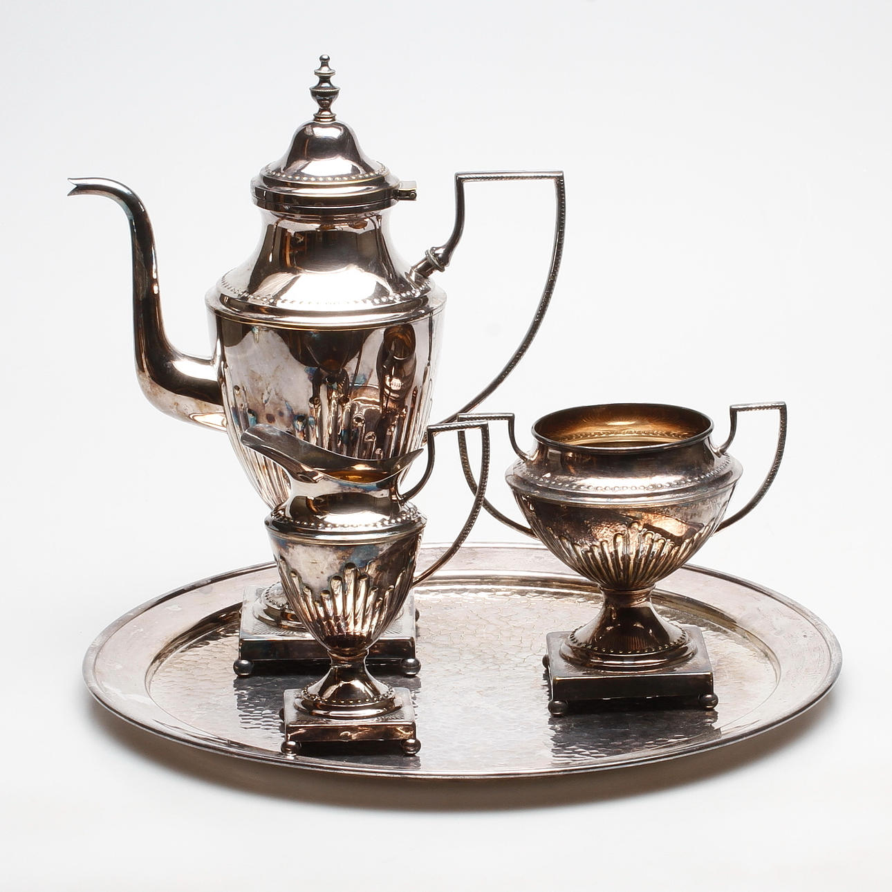 KAFFESERVIS, 4 delar, empirstil, nysilver, 1900-talets första hälft.