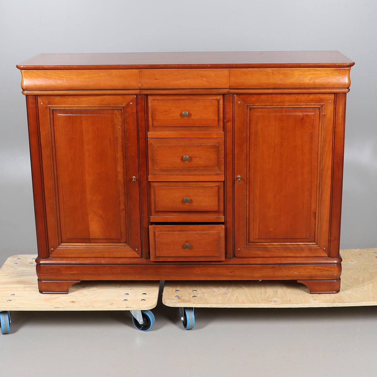 EXIGENCE A FRENCH CHERRYWOOD SIDEBOARD.