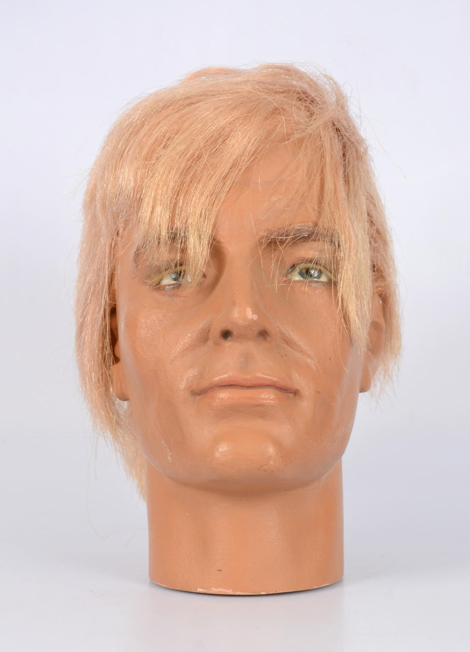 HUVUD TILL SKYLTDOCKA, 1900-talets andra hälft.