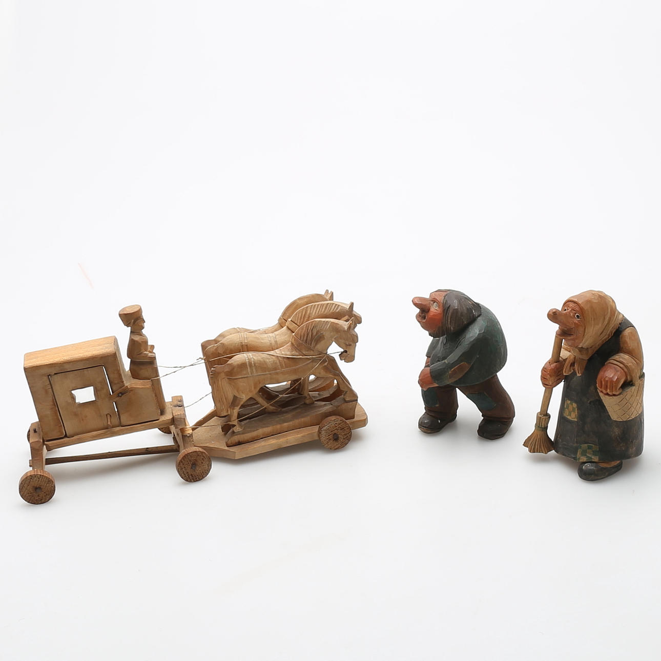 SKULPTURER i trä, 3 st, 1900-tal.